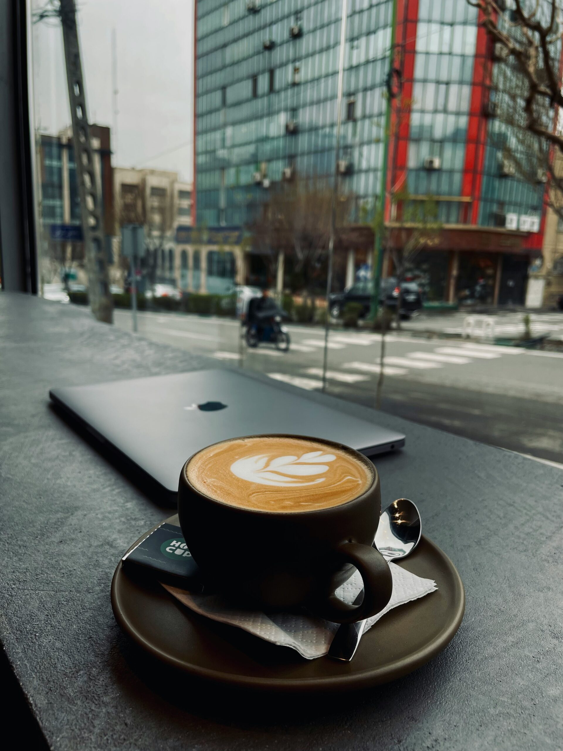 cup of coffee with urban backdrop