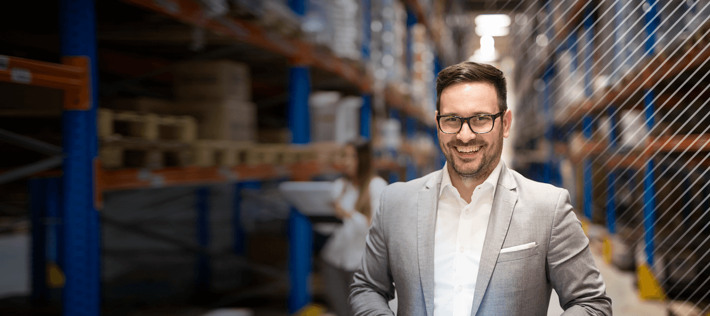 Unishippers franchise opportunity services industry man in warehouse