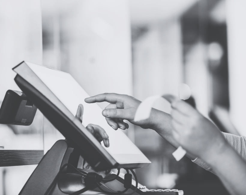 person's hands at a tablet