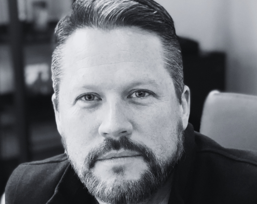 head shot of man with beard