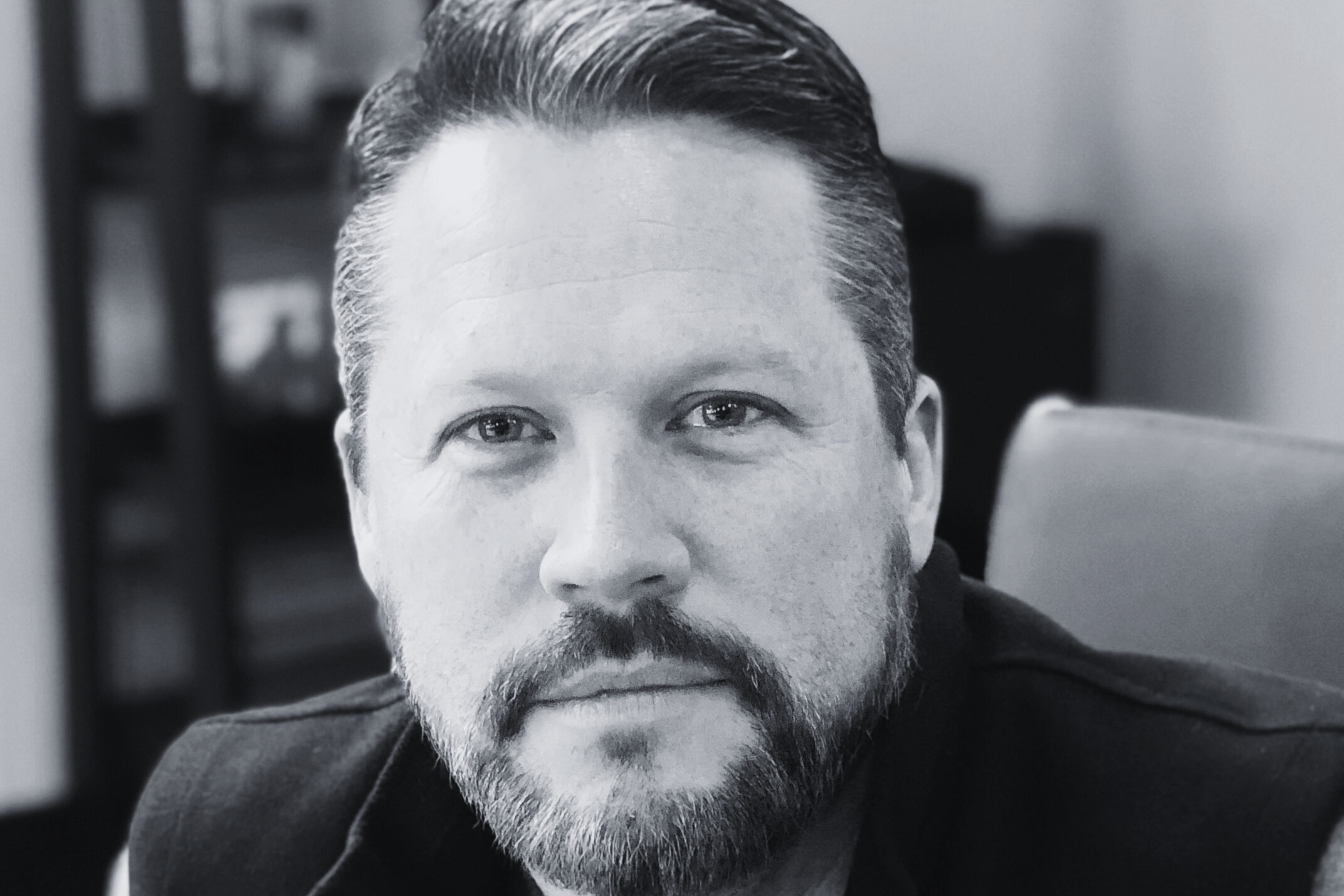 head shot of man with beard